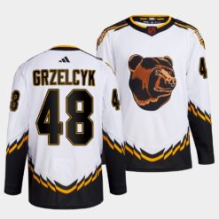Boston Bruins Matt Grzelcyk 2022 Reverse Retro 2.0 White Primegreen Jersey