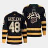 Boston Bruins Matt Grzelcyk 2022 Reverse Retro 2.0 White Primegreen Jersey